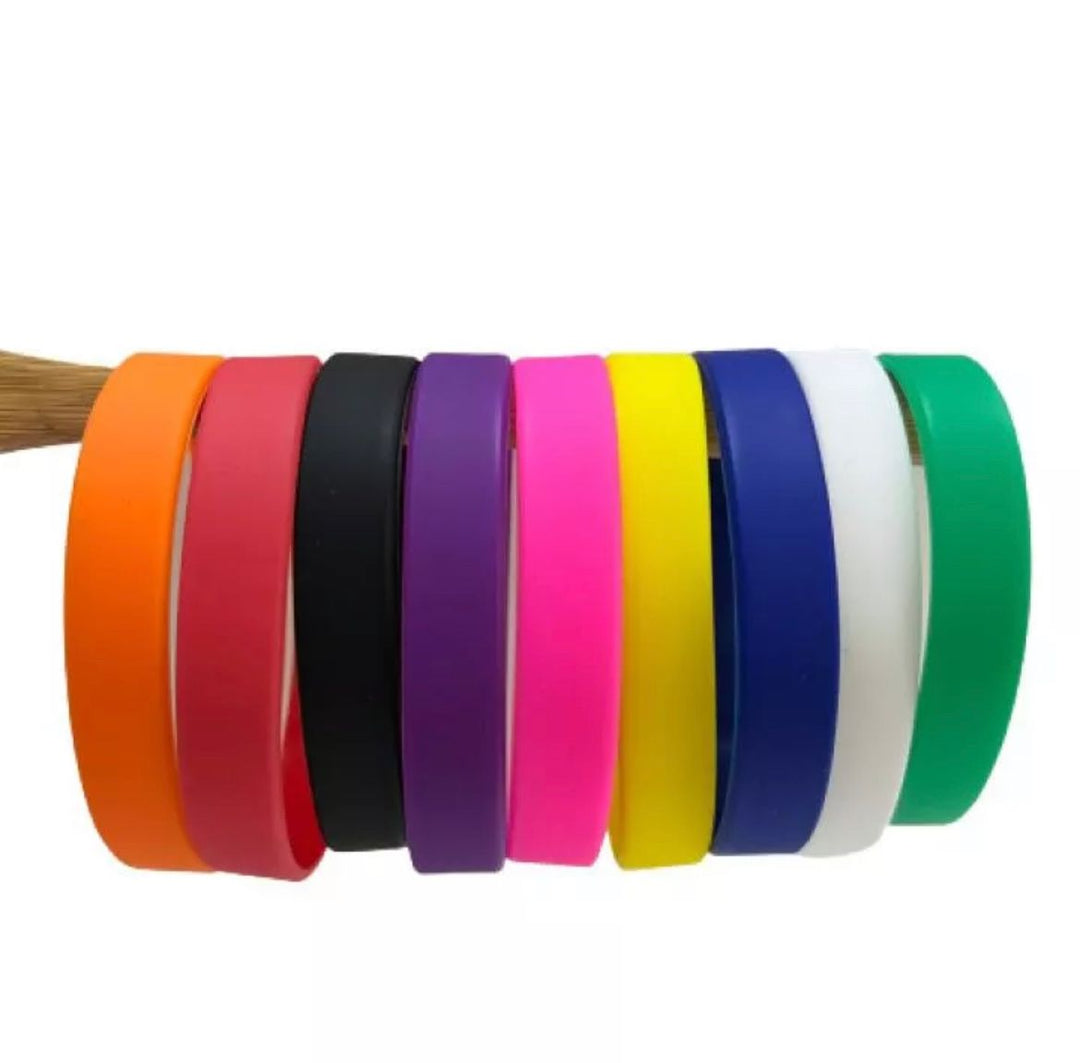 Custom silicone wristbands in multiple colours with debossed logo, bulk order for Singapore events